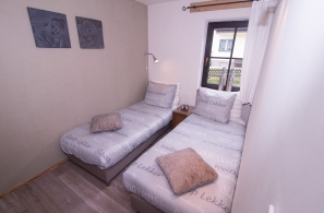 Slaapkamer van vakantiewoning Leogang in oostenrijk